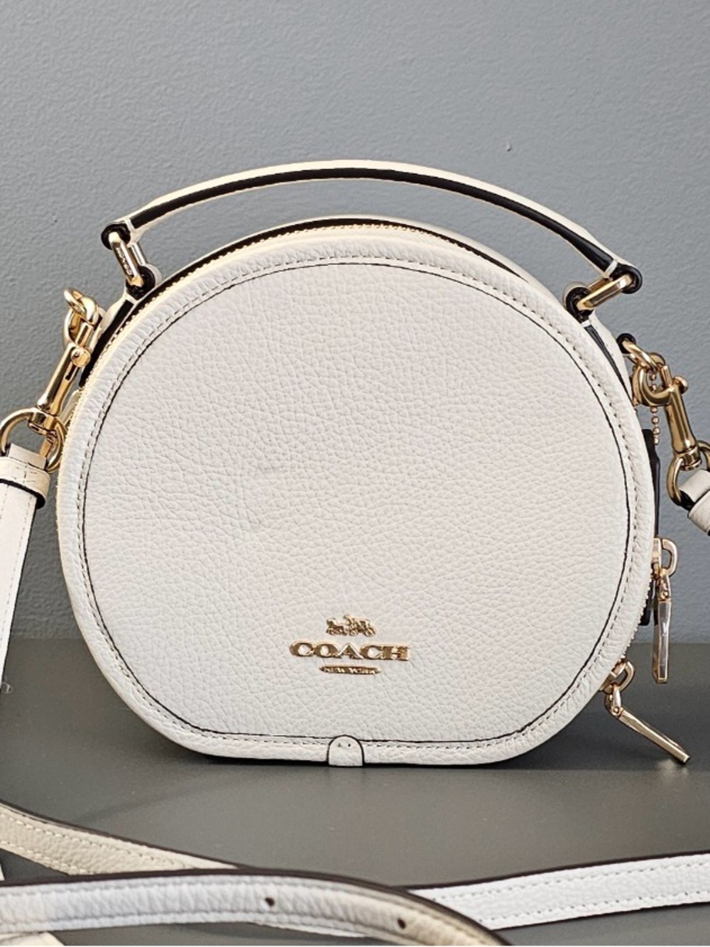 Coach Cream Pebbled Leather Round Crossbody Bag with Gold Hardware
